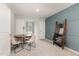 Bright dining area featuring a simple table, chairs, and unique decor, creating a welcoming space at 121 Black Oak Ct, Clayton, NC 27520