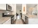 Modern kitchen featuring stainless steel appliances, granite countertops and an open layout at 121 Black Oak Ct, Clayton, NC 27520