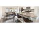 Kitchen featuring granite countertops, stainless steel appliances, a breakfast bar and eat-in kitchen at 121 Black Oak Ct, Clayton, NC 27520