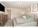 Relaxing main bedroom with decorative wall art and plush bedding, perfect for unwinding at 121 Black Oak Ct, Clayton, NC 27520