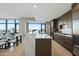 Sleek kitchen featuring a marble waterfall island, state-of-the-art appliances, and an open design layout at 122 N Harrington St # 1025, Raleigh, NC 27603