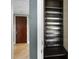 Built-in storage shelves and drawers located in the hallway at 122 N Harrington St # 1025, Raleigh, NC 27603