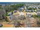 Aerial view of a neighborhood showcasing well-maintained homes and green spaces at 131 Tracker Ct, Garner, NC 27529