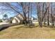 Generously sized backyard featuring mature trees and ample space to enjoy at 131 Tracker Ct, Garner, NC 27529