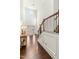 Bright foyer with hardwood floors, high ceilings, and staircase at 131 Tracker Ct, Garner, NC 27529