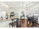 Bright kitchen with stainless appliances, granite countertops, subway tile backsplash, and a breakfast bar at 131 Tracker Ct, Garner, NC 27529