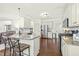 Kitchen featuring stainless steel appliances, granite countertops, a center island with breakfast bar at 131 Tracker Ct, Garner, NC 27529