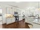 Bright kitchen featuring stainless steel appliances, granite countertops, and a breakfast bar at 131 Tracker Ct, Garner, NC 27529