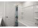 Bathroom featuring a shower-tub with white ceramic surround and a patterned curtain at 1401 Wrenn Rd, Durham, NC 27703