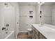 Bathroom featuring a shower-tub combo, ceramic tile flooring, and large vanity at 1401 Wrenn Rd, Durham, NC 27703