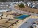 Community amenities include tennis court and playground with ample parking at 1401 Wrenn Rd, Durham, NC 27703