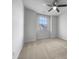 This simple bedroom includes neutral carpet, and a large window providing natural light and ventilation at 1419 Glenwater Dr, Cary, NC 27519
