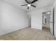 Bright, carpeted bedroom with ceiling fan and neutral walls at 1419 Glenwater Dr, Cary, NC 27519
