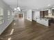 Open living space featuring hardwood floors, recessed lighting, and an open floor plan at 1419 Glenwater Dr, Cary, NC 27519