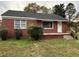 Charming single-story brick home with a cozy front porch and well-maintained lawn at 167 Spaulding Dr, Rocky Mount, NC 27801