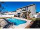 Secluded backyard pool area surrounded by landscaping and a white fence at 174 Coalyard Dr, Garner, NC 27529
