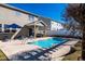 Private backyard pool with lounge chairs and landscaped surroundings at 174 Coalyard Dr, Garner, NC 27529