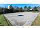 Community basketball court featuring two hoops and clearly marked lines on a concrete surface at 174 Coalyard Dr, Garner, NC 27529