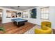 Game room featuring a pool table, large windows, and modern decor at 174 Coalyard Dr, Garner, NC 27529