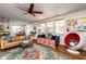 Bright and airy living room with wood floors, stylish furniture, and ample natural light at 174 Coalyard Dr, Garner, NC 27529
