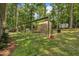 Spacious yard with a greenhouse, garden and plenty of space to play or entertain at 202 Brook Ln, Durham, NC 27712