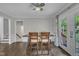 Inviting dining room featuring a wooden table and chairs, adjacent to outdoor access at 202 Brook Ln, Durham, NC 27712
