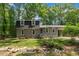 Charming two-story home with a well-manicured front yard and inviting curb appeal at 202 Brook Ln, Durham, NC 27712