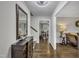Inviting foyer boasts dark hardwood flooring and elegant decor at 202 Brook Ln, Durham, NC 27712