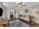 Inviting living room with hardwood floors, a decorative rug, and comfortable seating at 202 Brook Ln, Durham, NC 27712