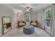 Comfortable living room with natural light, neutral tones, and cozy furniture at 202 Brook Ln, Durham, NC 27712