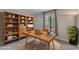 Bright office space with built-in wooden shelving and a large window offering natural light at 202 Brook Ln, Durham, NC 27712