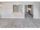 A living area featuring a kitchen and front door at 205 Dwelling Pl, Knightdale, NC 27545