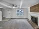 Bright living room with a fireplace and neutral decor at 205 Dwelling Pl, Knightdale, NC 27545