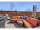 Backyard features a patio with modern outdoor seating and grill at 211 Brier Crossings Loop, Durham, NC 27703