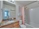 Bathroom with shower/tub combination and granite vanity at 211 Brier Crossings Loop, Durham, NC 27703