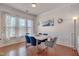Elegant dining room with modern decor, stylish chairs, and hardwood floors at 211 Brier Crossings Loop, Durham, NC 27703