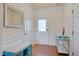 Welcoming entryway with wainscoting, a bench, and a mirrored wall decor at 211 Brier Crossings Loop, Durham, NC 27703