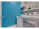 Functional laundry room with modern washer and dryer at 211 Brier Crossings Loop, Durham, NC 27703