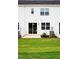 Backyard with a sliding glass door and a small patio area at 26 Twin Birch Dr, Angier, NC 27501