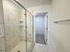 Modern bathroom featuring a frameless glass shower with built-in shelving at 26 Twin Birch Dr, Angier, NC 27501