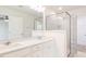 Modern bathroom with double vanity, sleek fixtures, and a glass-enclosed shower at 26 Twin Birch Dr, Angier, NC 27501