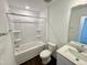 Bright bathroom featuring a shower-tub combo with a white surround and modern vanity at 26 Twin Birch Dr, Angier, NC 27501
