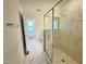 Elegant bathroom showcasing a frameless glass shower and tiled flooring at 26 Twin Birch Dr, Angier, NC 27501