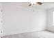 Well-lit bedroom with a neutral color palette, carpet flooring, and a window at 26 Twin Birch Dr, Angier, NC 27501