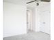 Spacious bedroom with a neutral color scheme, carpet flooring, and closet doors at 26 Twin Birch Dr, Angier, NC 27501