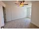 Bright bedroom featuring neutral tones and a ceiling fan at 26 Twin Birch Dr, Angier, NC 27501