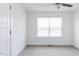Bright bedroom with a neutral color scheme and a window at 26 Twin Birch Dr, Angier, NC 27501