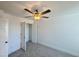 Carpeted bedroom with ample light and closet space at 26 Twin Birch Dr, Angier, NC 27501