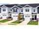 New construction townhomes feature attached garages, covered entries and beautifully landscaped lawns at 26 Twin Birch Dr, Angier, NC 27501