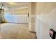 Unfinished garage awaiting personalization, offering space for storage and vehicles at 26 Twin Birch Dr, Angier, NC 27501